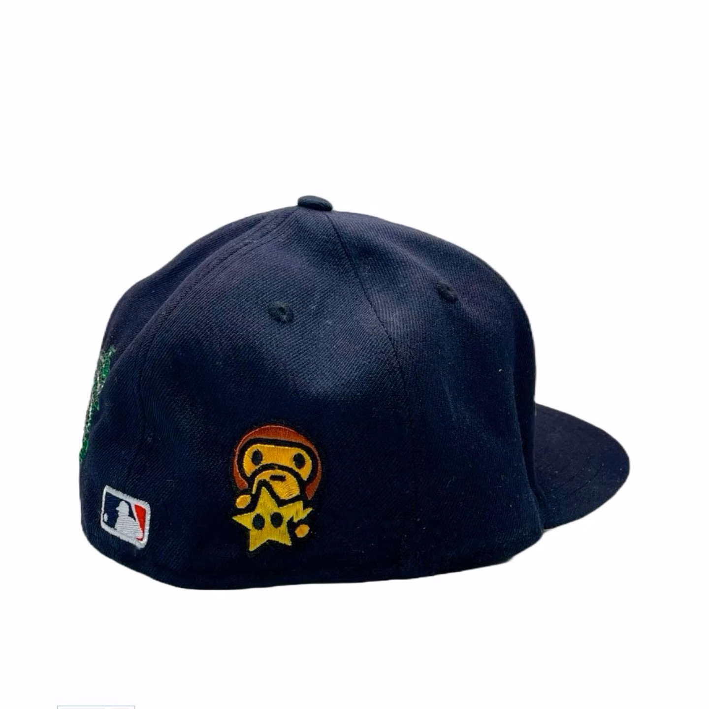 A baseball cap covered with colourful fabric patches.