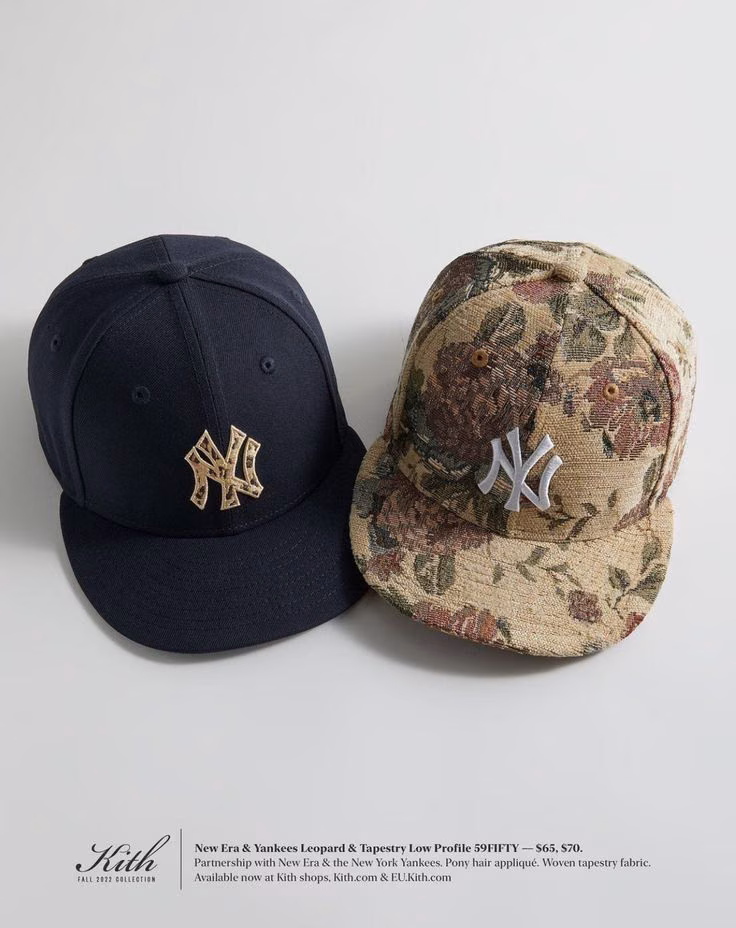 A navy and a floral-camouflage New York Yankees fitted cap displayed side by side.