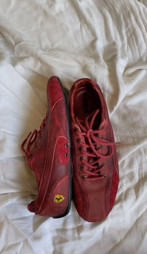 A pair of low Puma Speedcat Ferrari trainers.